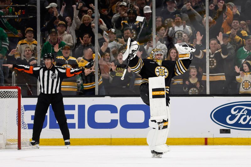 Feb 19, 2024; Boston, Massachusetts, USA; Boston Bruins goaltender Jeremy Swayman (1) celebrates after stopping the last shot in the shootout for a 4-3 win over the Dallas Stars at TD Garden. Mandatory Credit: Winslow Townson-USA TODAY Sports