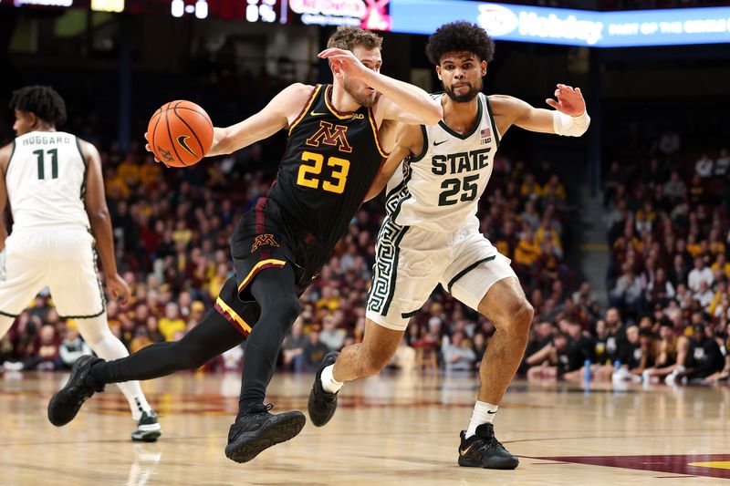 Feb 6, 2024; Minneapolis, Minnesota, USA; Minnesota Golden Gophers forward Parker Fox (23) works around Michigan State Spartans forward Malik Hall (25) during the first half at Williams Arena. Mandatory Credit: Matt Krohn-USA TODAY Sports