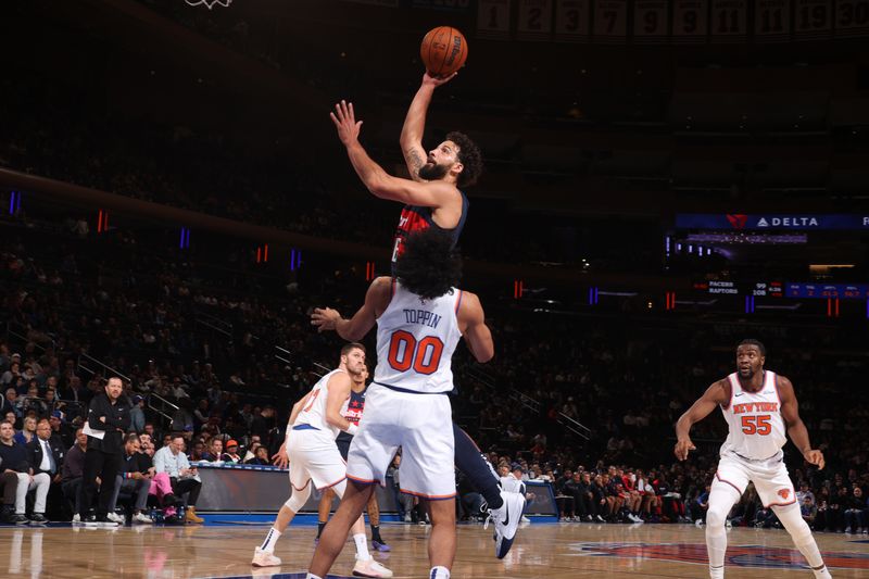 NEW YORK, NY - NOVEMBER 18: Anthony Gill #16 of the Washington Wizards drives to the basket during the game against the New York Knicks on November 18, 2024 at Madison Square Garden in New York City, New York.  NOTE TO USER: User expressly acknowledges and agrees that, by downloading and or using this photograph, User is consenting to the terms and conditions of the Getty Images License Agreement. Mandatory Copyright Notice: Copyright 2024 NBAE  (Photo by Nathaniel S. Butler/NBAE via Getty Images)