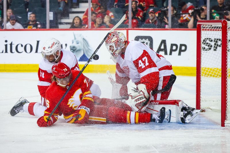 Feb 17, 2024; Calgary, Alberta, CAN; Detroit Red Wings goaltender James Reimer (47) makes a save against Calgary Flames center Martin Pospisil (76) during the third period at Scotiabank Saddledome. Mandatory Credit: Sergei Belski-USA TODAY Sports