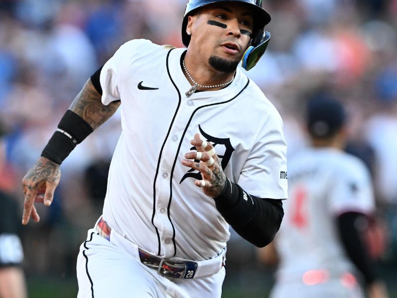 Jun 29, 2025; Detroit, Michigan, USA; Detroit Tigers shortstop Javier Báez (28) runs to third after tagging up on a fly ball to right field against the Minnesota Twins in the third inning at Comerica Park. Mandatory Credit: Lon Horwedel-Imagn Images