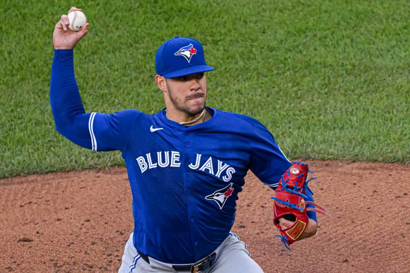 May 13, 2024; Baltimore, Maryland, USA;  Toronto Blue Jays pitcher José Berríos (17) throws a first inning pitch against the Baltimore Orioles at Oriole Park at Camden Yards. Mandatory Credit: Tommy Gilligan-USA TODAY Sports