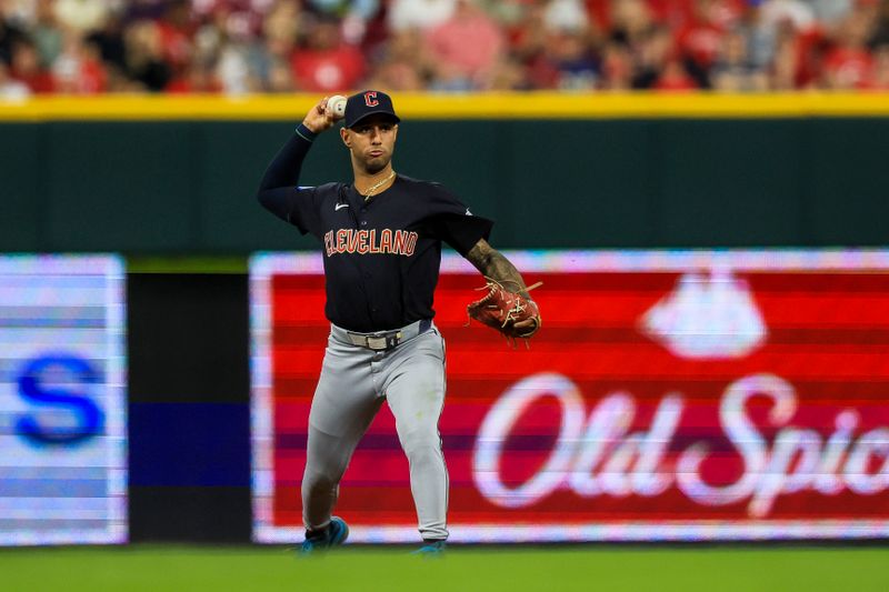 Jun 11, 2024; Cincinnati, Ohio, USA; Cleveland Guardians shortstop Brayan Rocchio (4) throws to first to get Cincinnati Reds third baseman Jeimer Candelario (not pictured) out in the eighth inning at Great American Ball Park. Mandatory Credit: Katie Stratman-USA TODAY Sports