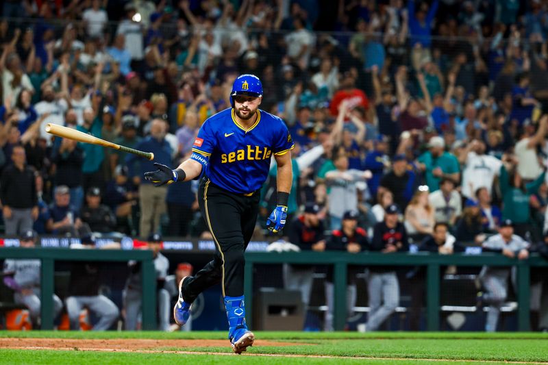 May 30, 2025; Seattle, Washington, USA; Seattle Mariners catcher Cal Raleigh (29) hits a two-run home run against the Minnesota Twins during the eighth inning at T-Mobile Park. Mandatory Credit: Joe Nicholson-Imagn Images