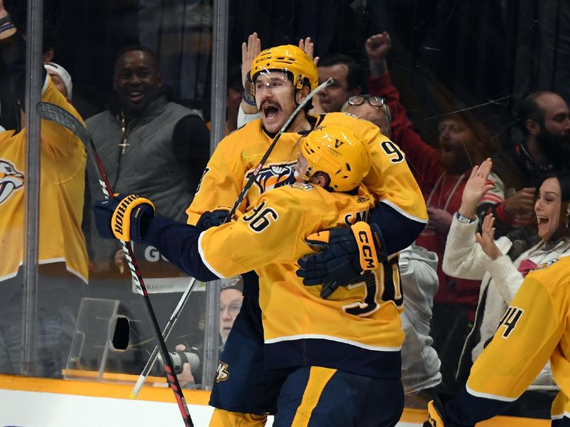 Dec 12, 2023; Nashville, Tennessee, USA; Nashville Predators left wing Filip Forsberg (9) celebrates after the scoring the game-winning goal in overtime against the Philadelphia Flyers at Bridgestone Arena. Mandatory Credit: Christopher Hanewinckel-USA TODAY Sports