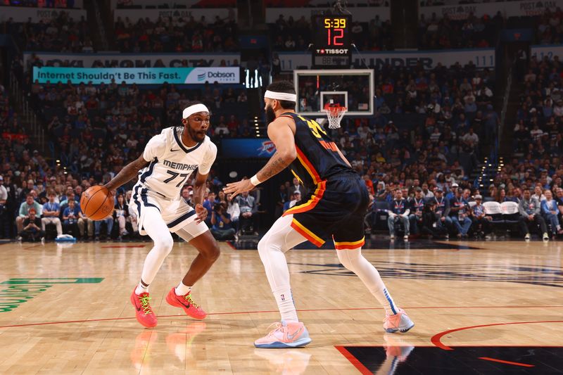 OKLAHOMA CITY, OK - MARCH 10: DeJon Jarreau #77 of the Memphis Grizzlies handles the ball during the game against the Houston Rockets on March 10, 2024 at Paycom Arena in Oklahoma City, Oklahoma. NOTE TO USER: User expressly acknowledges and agrees that, by downloading and or using this photograph, User is consenting to the terms and conditions of the Getty Images License Agreement. Mandatory Copyright Notice: Copyright 2024 NBAE (Photo by Zach Beeker/NBAE via Getty Images)