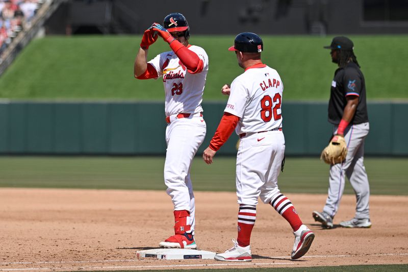 Apr 7, 2024; St. Louis, Missouri, USA; St. Louis Cardinals third baseman Nolan Arenado (28) reacts after a hit against the Miami Marlins during the sixth inning at Busch Stadium. Mandatory Credit: Jeff Le-USA TODAY Sports