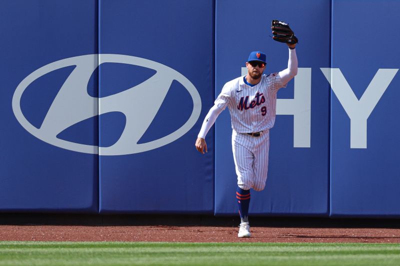 Apr 20, 2025; New York City, New York, USA; New York Mets left fielder Brandon Nimmo (9) reacts after making a catch to save a home run hit by St. Louis Cardinals right fielder Jordan Walker (not pictured) during the sixth inning at Citi Field. Mandatory Credit: Vincent Carchietta-Imagn Images