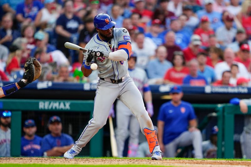 Sep 14, 2024; Philadelphia, Pennsylvania, USA; New York Mets right fielder Starling Marte (6) gets hit by a pitch during the eighth inning against the Philadelphia Phillies at Citizens Bank Park. Mandatory Credit: Gregory Fisher-Imagn Images