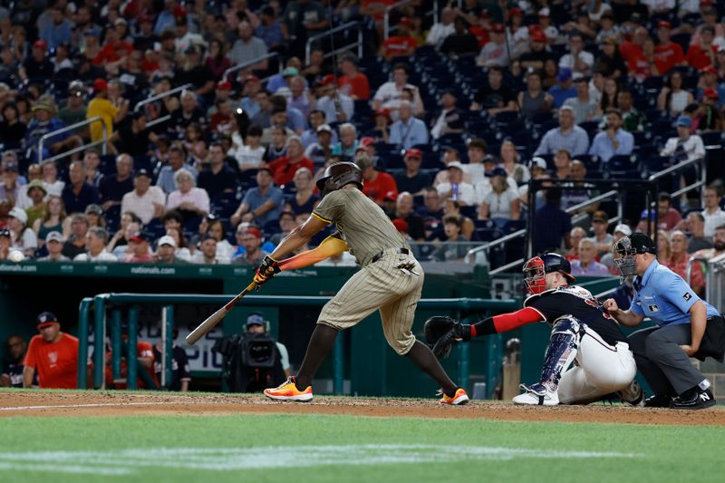 Jul 24, 2024; Washington, District of Columbia, USA; San Diego Padres second baseman Xander Bogaerts (2) singles against the Washington Nationals during the seventh inning at Nationals Park. Mandatory Credit: Geoff Burke-USA TODAY Sports