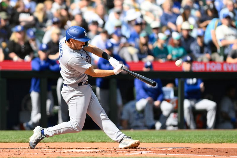 Sep 17, 2023; Seattle, Washington, USA; Los Angeles Dodgers catcher Austin Barnes (15) hits a 2-run home run against the Seattle Mariners during the second inning at T-Mobile Park. Mandatory Credit: Steven Bisig-USA TODAY Sports