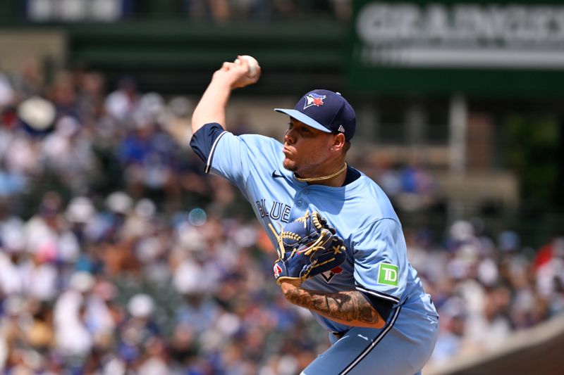 Aug 16, 2024; Chicago, Illinois, USA;  Toronto Blue Jays pitcher Yariel RodrÌguez (29) delivers the ball against the Chicago Cubs during the first inning at Wrigley Field. Mandatory Credit: Matt Marton-USA TODAY Sports