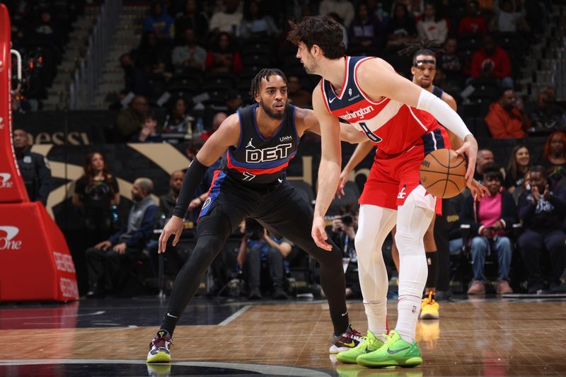 WASHINGTON, DC -? MARCH 29:  Troy Brown Jr. #7 of the Detroit Pistons plays defense during the game  against Deni Avdija #8 of the Washington Wizards on March 29, 2024 at Capital One Arena in Washington, DC. NOTE TO USER: User expressly acknowledges and agrees that, by downloading and or using this Photograph, user is consenting to the terms and conditions of the Getty Images License Agreement. Mandatory Copyright Notice: Copyright 2024 NBAE (Photo by Stephen Gosling/NBAE via Getty Images)