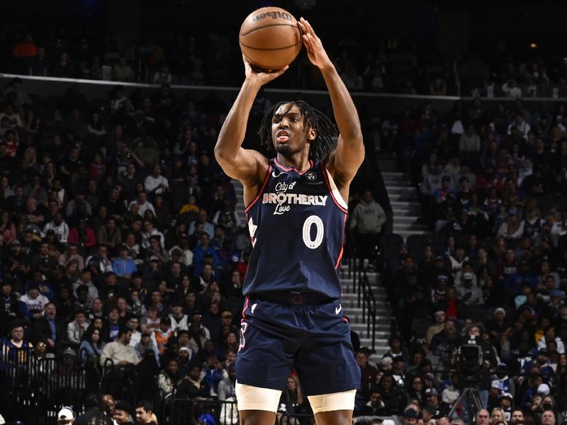 PHILADELPHIA, PA - FEBRUARY 7:  Tyrese Maxey #0 of the Philadelphia 76ers shoots the ball during the game  on February 7, 2024 at the Wells Fargo Center in Philadelphia, Pennsylvania NOTE TO USER: User expressly acknowledges and agrees that, by downloading and/or using this Photograph, user is consenting to the terms and conditions of the Getty Images License Agreement. Mandatory Copyright Notice: Copyright 2024 NBAE (Photo by David Dow/NBAE via Getty Images)