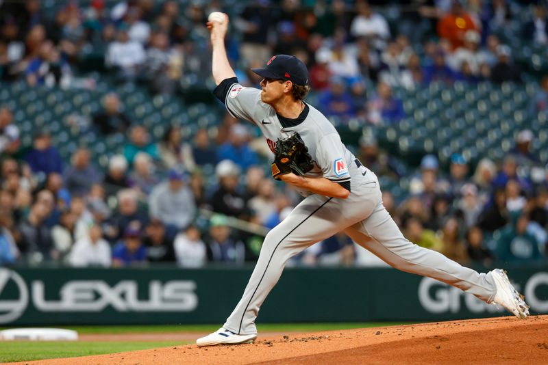 Apr 2, 2024; Seattle, Washington, USA; Cleveland Guardians starting pitcher Shane Bieber (57) throws against the Seattle Mariners during the first inning at T-Mobile Park. Mandatory Credit: Joe Nicholson-USA TODAY Sports