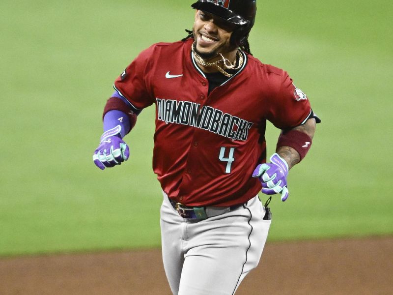 Jun 6, 2024; San Diego, California, USA; Arizona Diamondbacks second baseman Ketel Marte (4) rounds the bases after hitting a two-run home run during the seventh inning against the San Diego Padres at Petco Park. Mandatory Credit: Denis Poroy-USA TODAY Sports at Petco Park. 