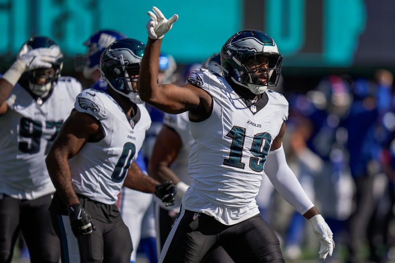 Philadelphia Eagles linebacker Josh Sweat (19) reacts after sacking New York Giants quarterback Daniel Jones (8) during the first quarter of an NFL football game, Sunday, Oct. 20, 2024, in East Rutherford, N.J. (AP Photo/Frank Franklin II)