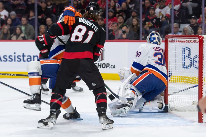 Dec 8, 2024; Ottawa, Ontario, CAN; Ottawa Senators right wing Adam Gaudette (81) jockeys for position in front of New York Islanders goalie Ilya Sorokin (30) in the first period at the Canadian Tire Centre. Mandatory Credit: Marc DesRosiers-Imagn Images