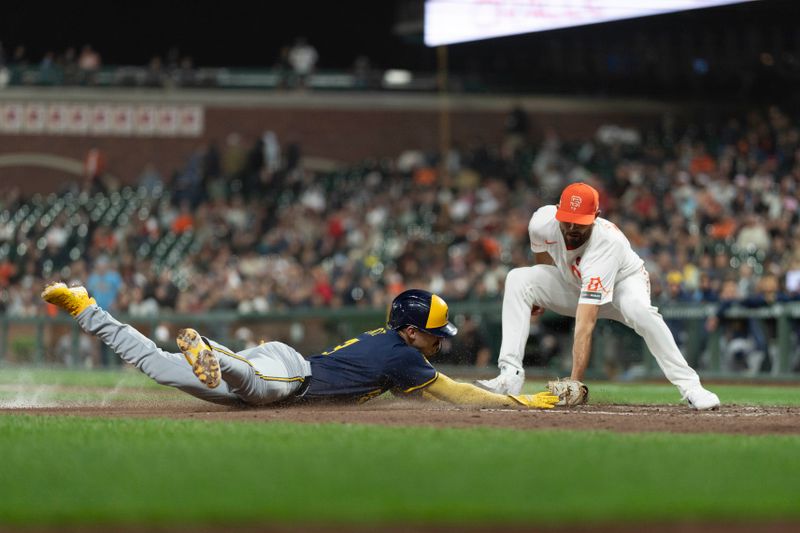 Sep 10, 2024; San Francisco, California, USA;  Milwaukee Brewers third base Joey Ortiz (3) dives towards home plate during the seventh inning against San Francisco Giants pitcher Tristan Beck (43) at Oracle Park. Mandatory Credit: Stan Szeto-Imagn Images