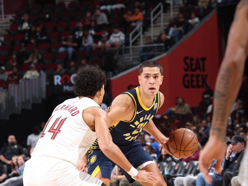 Cleveland, OH - OCTOBER 10: Cole Swider #21 of the Indiana Pacers dribbles the ball during the game against the Cleveland Cavaliers during a NBA pre season game on October 10, 2024 at Rocket Mortgage Fieldhouse in Cleveland, Ohio. NOTE TO USER: User expressly acknowledges and agrees that, by downloading and or using this photograph, User is consenting to the terms and conditions of the Getty Images License Agreement. Mandatory Copyright Notice: Copyright 2024 NBAE (Photo by Jeff Haynes/NBAE via Getty Images)