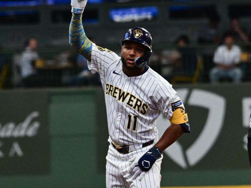 May 3, 2025; Milwaukee, Wisconsin, USA; Milwaukee Brewers center fielder Jackson Chourio (11) reacts after hitting a double in the third inning against the Chicago Cubs at American Family Field. Mandatory Credit: Benny Sieu-Imagn Images