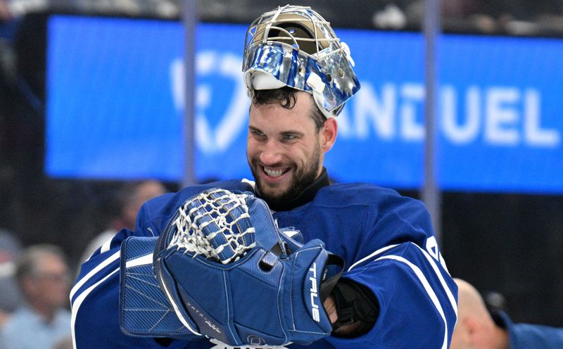 Sep 26, 2024; Toronto, Ontario, CAN;  Toronto Maple Leafs goalie Anthony Stolarz (41) adjusts his equipment during a time out against the Montreal Canadiens in the second period at Scotiabank Arena. Mandatory Credit: Dan Hamilton-Imagn Images