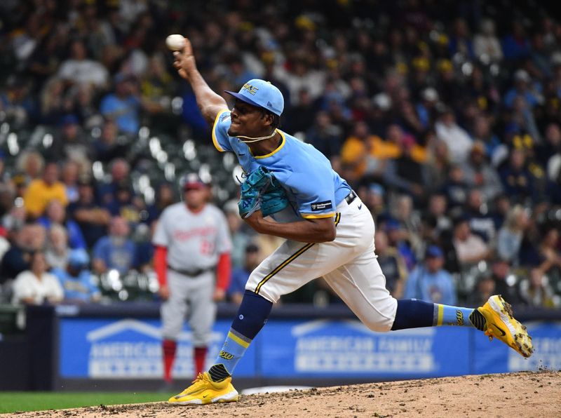 Sep 15, 2023; Milwaukee, Wisconsin, USA; Milwaukee Brewers pitcher Abner Uribe (45) delivers a pitch against the Washington Nationals in the seventh inning at American Family Field. Mandatory Credit: Michael McLoone-USA TODAY Sports