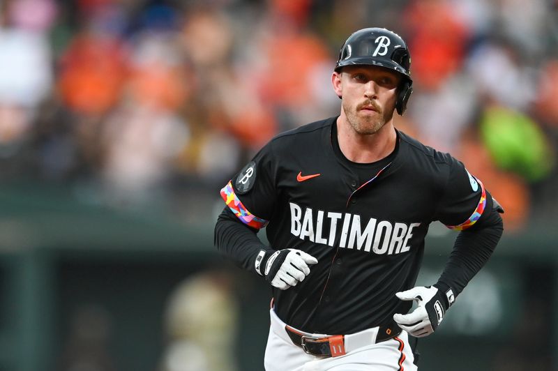 Jul 26, 2024; Baltimore, Maryland, USA;  Baltimore Orioles third baseman Jordan Westburg (11) rounds third base after hitting a solo home run in the second inning against the San Diego Padres at Oriole Park at Camden Yards. Mandatory Credit: Tommy Gilligan-USA TODAY Sports