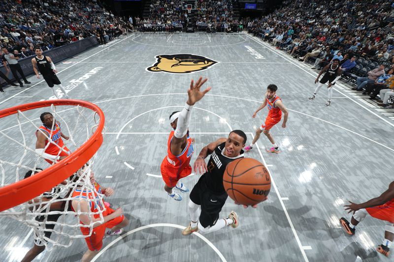 MEMPHIS, TN - MARCH 16:  Desmond Bane #22 of the Memphis Grizzlies drives to the basket during the game against the Oklahoma City Thunder on March 16, 2024 at FedExForum in Memphis, Tennessee. NOTE TO USER: User expressly acknowledges and agrees that, by downloading and or using this photograph, User is consenting to the terms and conditions of the Getty Images License Agreement. Mandatory Copyright Notice: Copyright 2024 NBAE (Photo by Joe Murphy/NBAE via Getty Images)