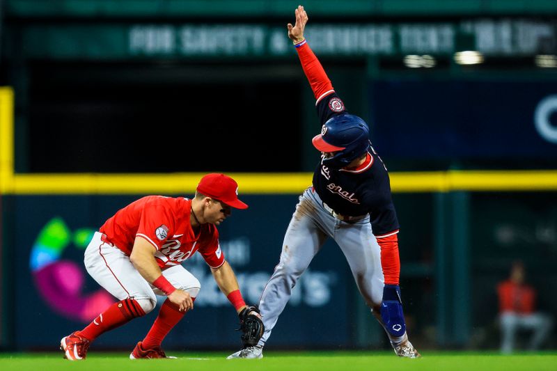 May 3, 2025; Cincinnati, Ohio, USA; Washington Nationals outfielder Dylan Crews (3) steals second against Cincinnati Reds second baseman Matt McLain (9) in the seventh inning at Great American Ball Park. Mandatory Credit: Katie Stratman-Imagn Images