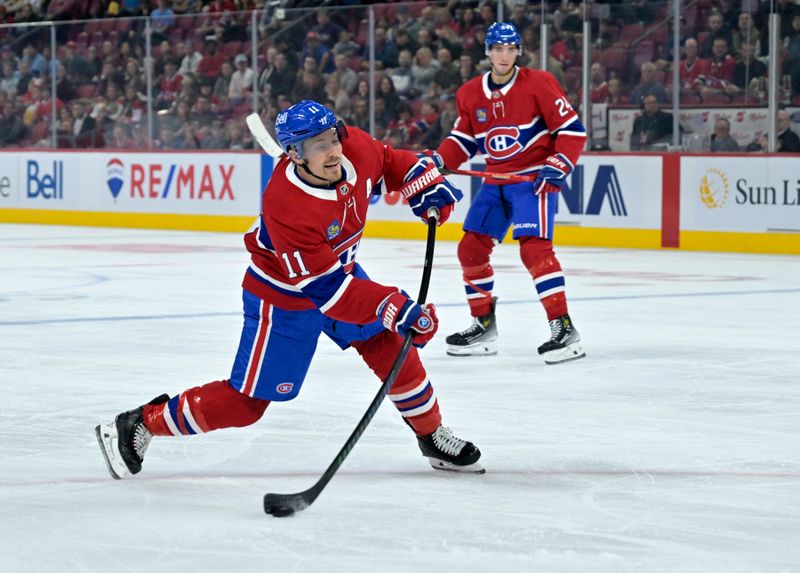 Sep 24, 2024; Montreal, Quebec, CAN; Montreal Canadiens forward Brendan Gallagher (11) shoots on net during the first period of the game against the New Jersey Devils at the Bell Centre. Mandatory Credit: Eric Bolte-Imagn Images