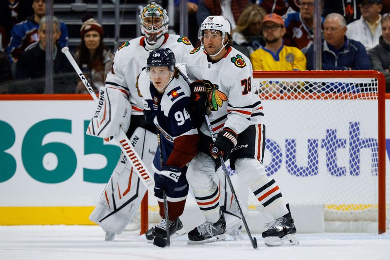 Oct 28, 2024; Denver, Colorado, USA; Colorado Avalanche left wing Joel Kiviranta (94) and Chicago Blackhawks defenseman TJ Brodie (78) battle for position in front of goaltender Petr Mrazek (34) in the third period at Ball Arena. Mandatory Credit: Isaiah J. Downing-Imagn Images