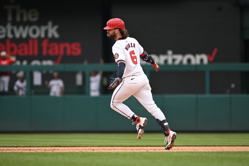 Jul 4, 2024; Washington, District of Columbia, USA; Washington Nationals left fielder Jesse Winker (6) celebrates as he runs around the bases after hitting a home run against the New York Mets during the eighth inning at Nationals Park. Mandatory Credit: Rafael Suanes-USA TODAY Sports