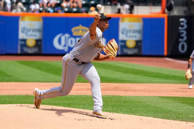 Aug 16, 2023; New York City, New York, USA; Pittsburgh Pirates pitcher Johan Oviedo (24) delivers a pitch against the New York Mets during the first inning at Citi Field. Mandatory Credit: Gregory Fisher-USA TODAY Sports