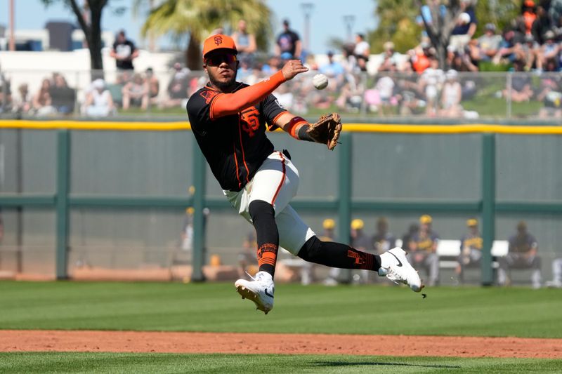 Mar 5, 2024; Scottsdale, Arizona, USA; San Francisco Giants second baseman Thairo Estrada (39) makes the throw for an out against the Milwaukee Brewers in the first inning at Scottsdale Stadium. Mandatory Credit: Rick Scuteri-USA TODAY Sports