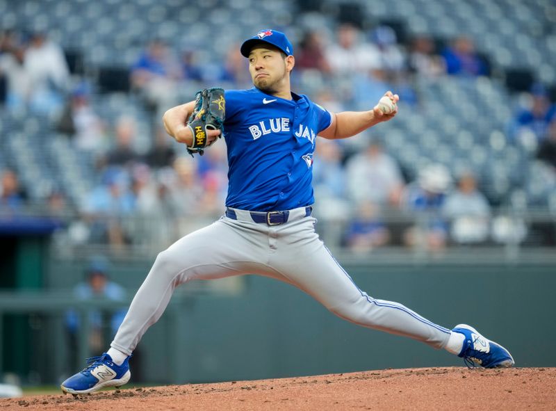 Apr 22, 2024; Kansas City, Missouri, USA; Toronto Blue Jays pitcher Yusei Kikuchi (16) pitches during the first inning against the Kansas City Royals at Kauffman Stadium. Mandatory Credit: Jay Biggerstaff-USA TODAY Sports