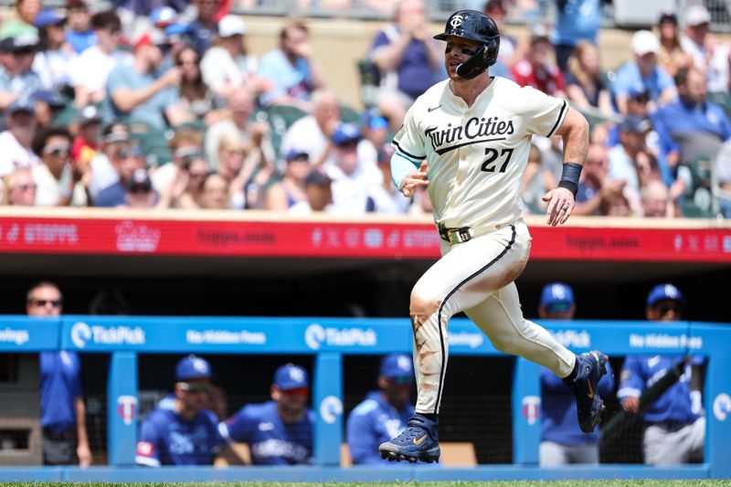 May 25, 2025; Minneapolis, Minnesota, USA; Minnesota Twins catcher Ryan Jeffers (27) scores on a single hit by first baseman Ty France (13) during the first inning against the Kansas City Royals at Target Field. Mandatory Credit: Matt Krohn-Imagn Images