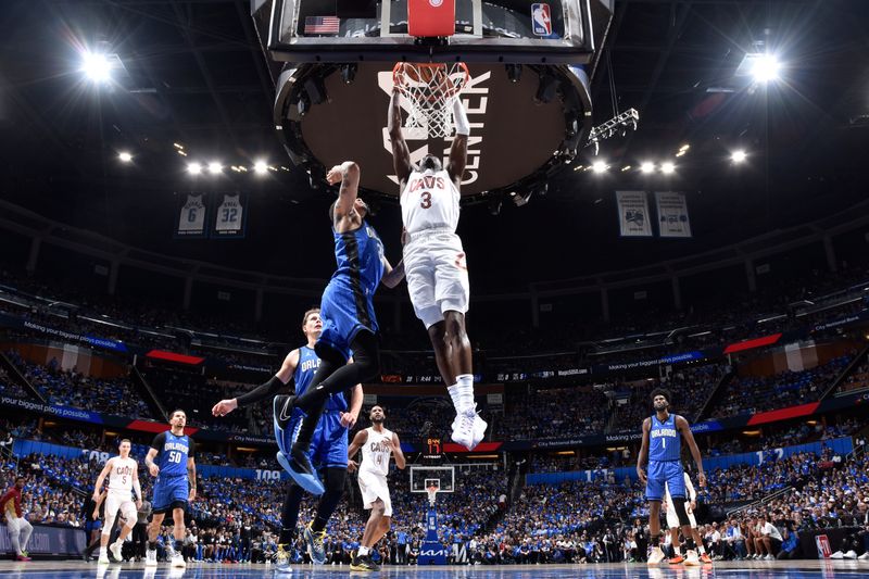 ORLANDO, FL - APRIL 25: Caris LeVert #3 of the Cleveland Cavaliers slam dunk the ball during the game against the Orlando Magic during Round 1 Game 3 of the 2024 NBA Playoffs on April 25, 2024 at Kia Center in Orlando, Florida. NOTE TO USER: User expressly acknowledges and agrees that, by downloading and or using this photograph, User is consenting to the terms and conditions of the Getty Images License Agreement. Mandatory Copyright Notice: Copyright 2023 NBAE (Photo by Fernando Medina/NBAE via Getty Images)