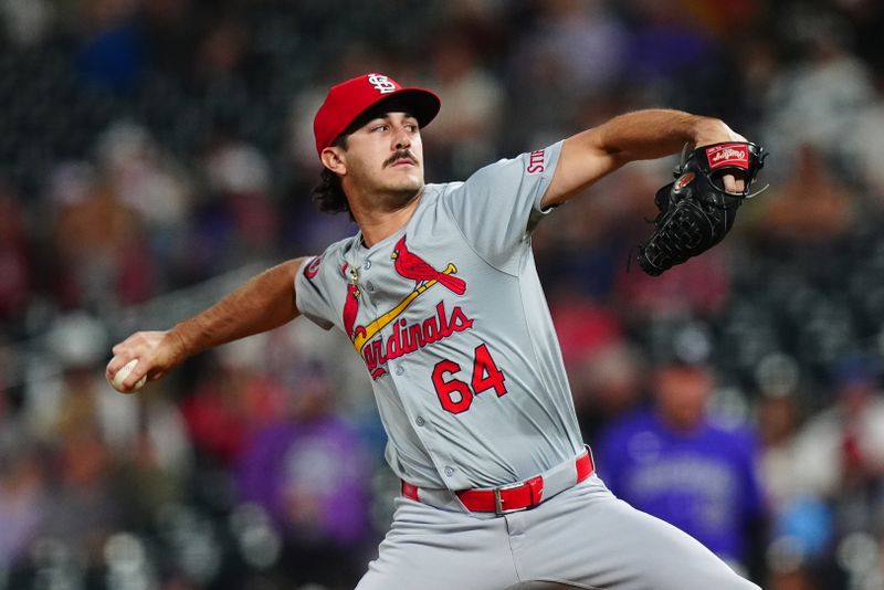 Sep 24, 2024; Denver, Colorado, USA; St. Louis Cardinals relief pitcher Ryan Fernandez (64) pitches in the ninth inning against the Colorado Rockies at Coors Field. Mandatory Credit: Ron Chenoy-Imagn Images