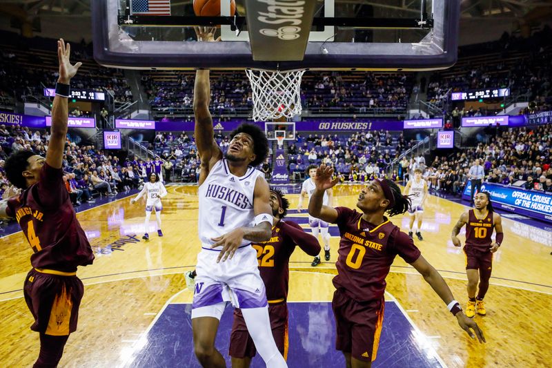 Jan 26, 2023; Seattle, Washington, USA; Washington Huskies forward Keion Brooks (1) shoots a layup against Arizona State Sun Devils guard Desmond Cambridge Jr. (4), forward Warren Washington (22) and guard DJ Horne (0) during the first half at Alaska Airlines Arena at Hec Edmundson Pavilion. Mandatory Credit: Joe Nicholson-USA TODAY Sports