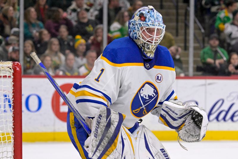 Feb 17, 2024; Saint Paul, Minnesota, USA;  Buffalo Sabres goalie Ukko-Pekka Luukkonen (1) follows the play against the Minnesota Wild during the second period at Xcel Energy Center. Mandatory Credit: Nick Wosika-USA TODAY Sports