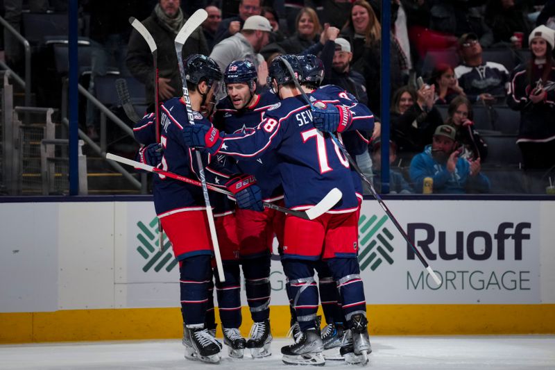 Nov 2, 2023; Columbus, Ohio, USA;  Columbus Blue Jackets center Boone Jenner (38) celebrates with teammates after scoring a goal against the Tampa Bay Lightning in the third period at Nationwide Arena. Mandatory Credit: Aaron Doster-USA TODAY Sports