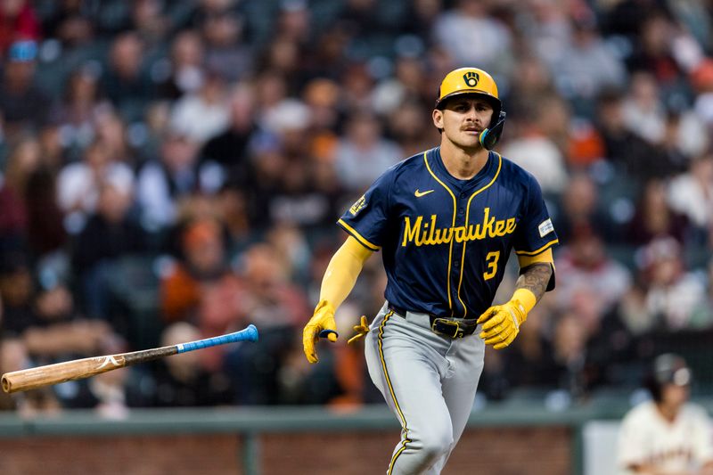 Sep 11, 2024; San Francisco, California, USA; Milwaukee Brewers third baseman Joey Ortiz (3) is walked by San Francisco Giants starting pitcher Blake Snell (7) to load the bases  during the second inning at Oracle Park. Mandatory Credit: John Hefti-Imagn Images