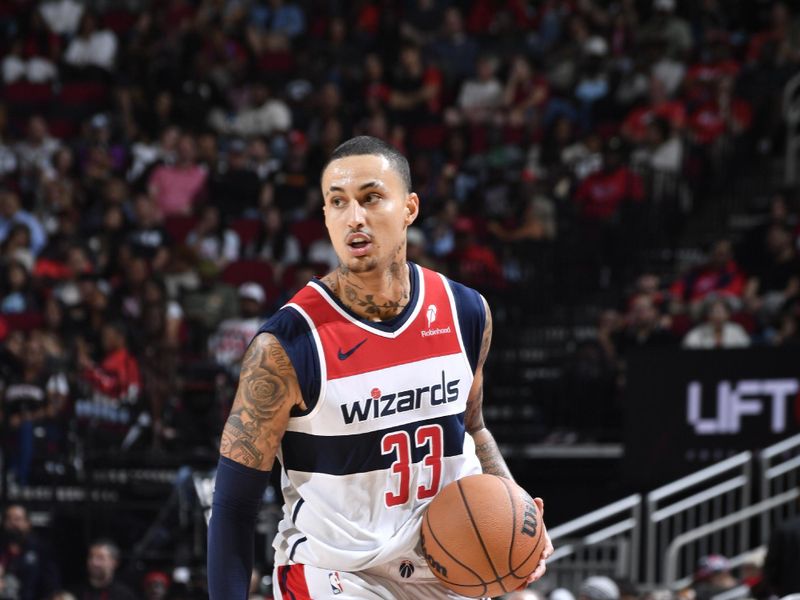 HOUSTON, TX - NOVEMBER 11: Kyle Kuzma #33 of the Washington Wizards dribbles the ball during the game against the Houston Rockets on November 11, 2024 at the Toyota Center in Houston, Texas. NOTE TO USER: User expressly acknowledges and agrees that, by downloading and or using this photograph, User is consenting to the terms and conditions of the Getty Images License Agreement. Mandatory Copyright Notice: Copyright 2024 NBAE (Photo by Logan Riely/NBAE via Getty Images)