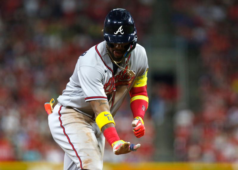 Jun 23, 2023; Cincinnati, Ohio, USA; Atlanta Braves right fielder Ronald Acuna Jr. (13) reacts as he runs the bases after hitting a solo home run during the eighth inning against the Cincinnati Reds at Great American Ball Park. Mandatory Credit: David Kohl-USA TODAY Sports