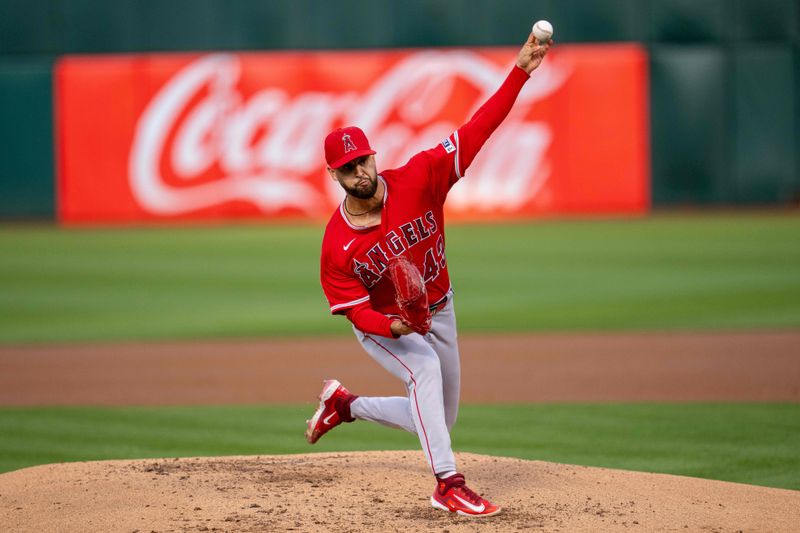 Sep 1, 2023; Oakland, California, USA;  Los Angeles Angels starting pitcher Patrick Sandoval (43) delivers a pitch against the Oakland Athletics during the first inning at Oakland-Alameda County Coliseum. Mandatory Credit: Neville E. Guard-USA TODAY Sports