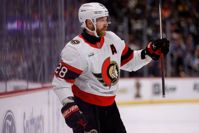 Oct 27, 2024; Denver, Colorado, USA; Ottawa Senators right wing Claude Giroux (28) celebrates after his goal in the third period against the Colorado Avalanche at Ball Arena. Mandatory Credit: Isaiah J. Downing-Imagn Images