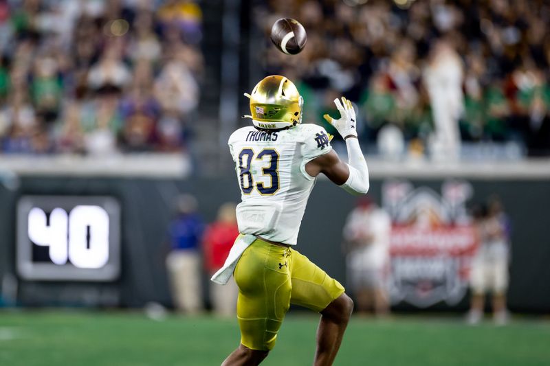 Dec 30, 2022; Jacksonville, FL, USA; Notre Dame Fighting Irish wide receiver Jayden Thomas (83) makes a catch during the second half against the South Carolina Gamecocks in the 2022 Gator Bowl at TIAA Bank Field. Mandatory Credit: Matt Pendleton-USA TODAY Sports