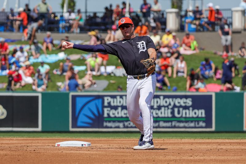 Mar 21, 2024; Lakeland, Florida, USA; Detroit Tigers second baseman Colt Keith (33) throws to first during the third inning against the New York Mets at Publix Field at Joker Marchant Stadium. Mandatory Credit: Mike Watters-USA TODAY Sports