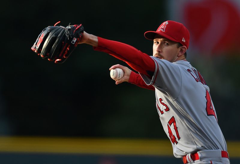 Jun 24, 2023; Denver, Colorado, USA; Los Angeles Angels starting pitcher Griffin Canning (47) delivers a pitch in the first inning against the Colorado Rockies at Coors Field. Mandatory Credit: John Leyba-USA TODAY Sports